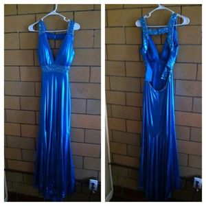 Two prom dresses and a maternity wedding dress