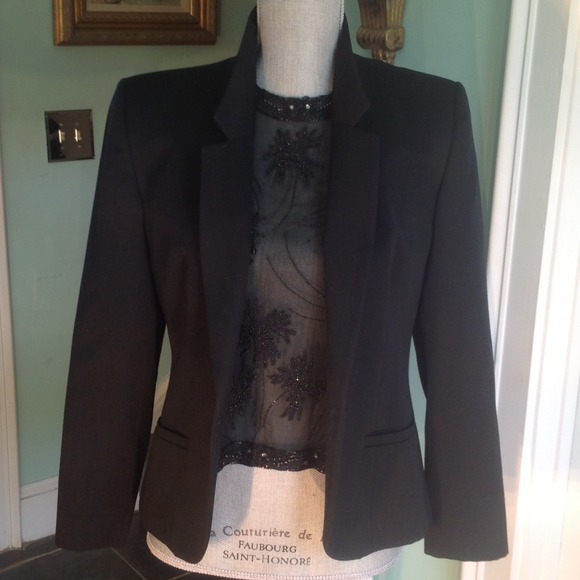 Coco Beland black jacket