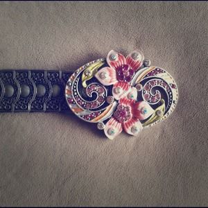 Silver belt with flower buckle