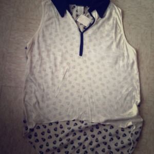 Collared skulls high low tank top.