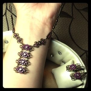 18 inch necklace with leaver back earrings.