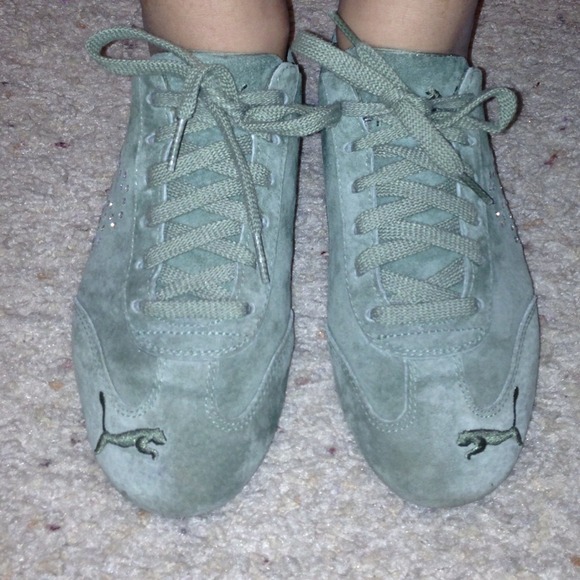 Puma sneakers olive green color.