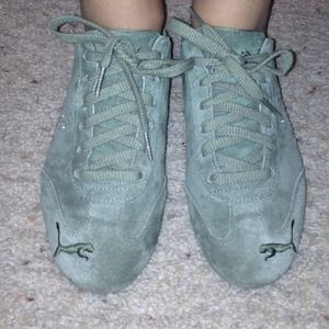 Puma sneakers olive green color.
