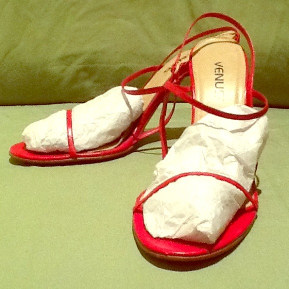 Venus red strappy pumps.