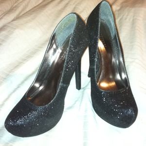 Black shiny high heels