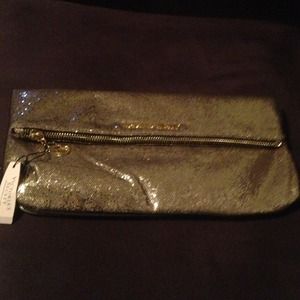 Sparkly gold Victoria's Secret clutch.