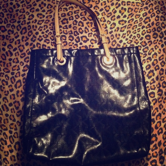 Michael Kors , Black and Tan leather .