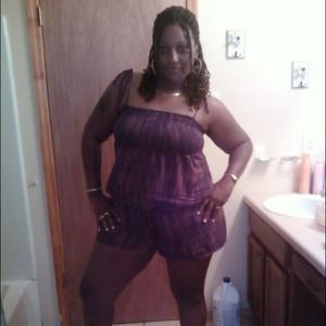 Eyeshadow, brown romper, purchased at Macys.