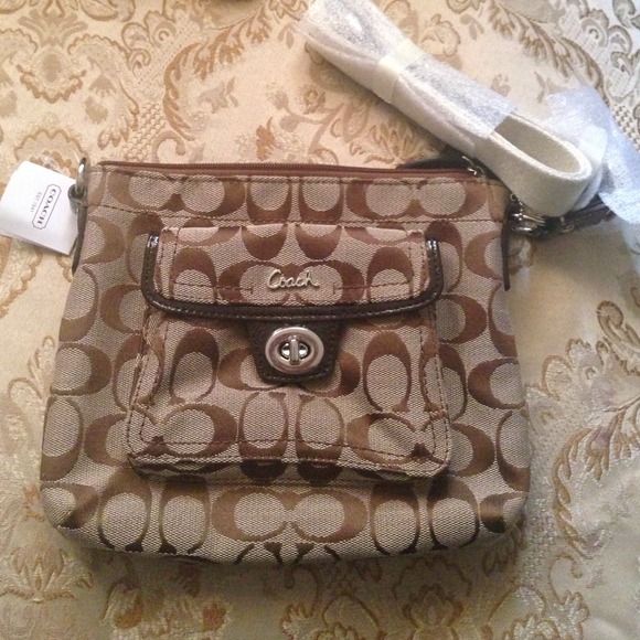 Coach Handbags - COACH Signature Crossbody Pocket Swingpack