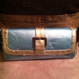 Gifted...Brand new blue and silver clutch.