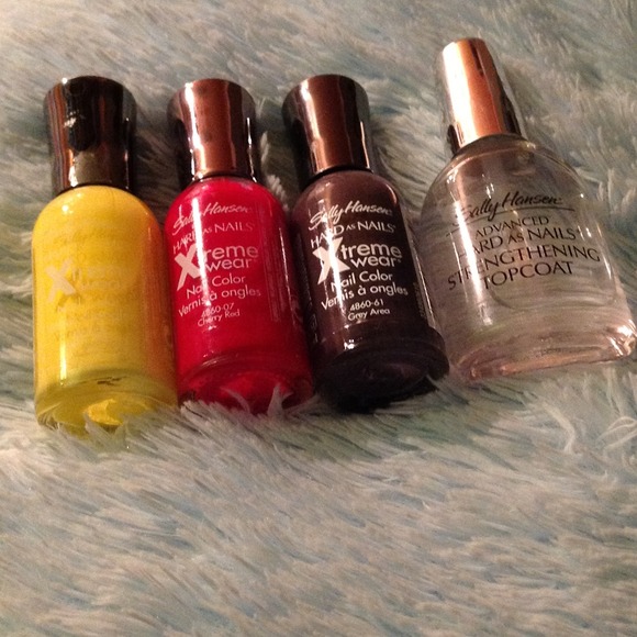Sold ---- 4 Sally Hansen nail polishes