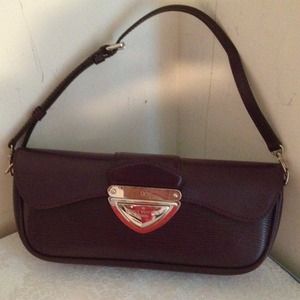 one of my fav collectibles lv purple clutch