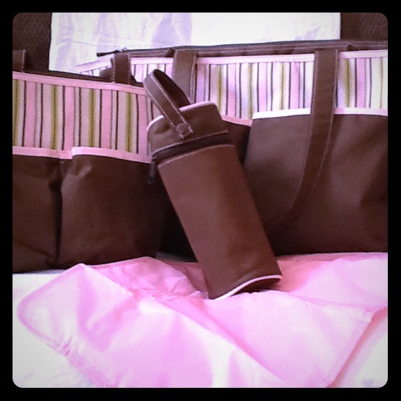 Four piece diaper bag set.