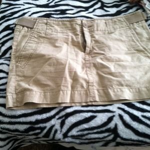 Tan mini skirt hardly ever worn looks like new