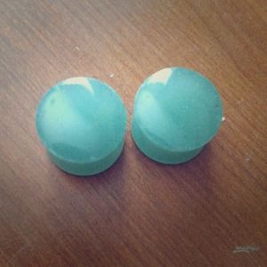 Green glass gauges.