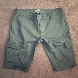 Army green knee length shorts.