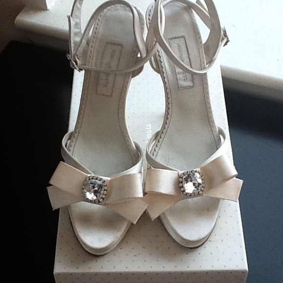 XX SOLD XX Off White front wedge shoes.