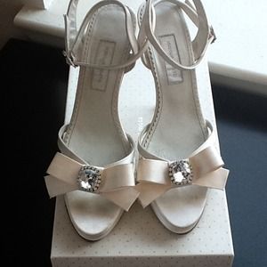 XX SOLD XX Off White front wedge shoes.