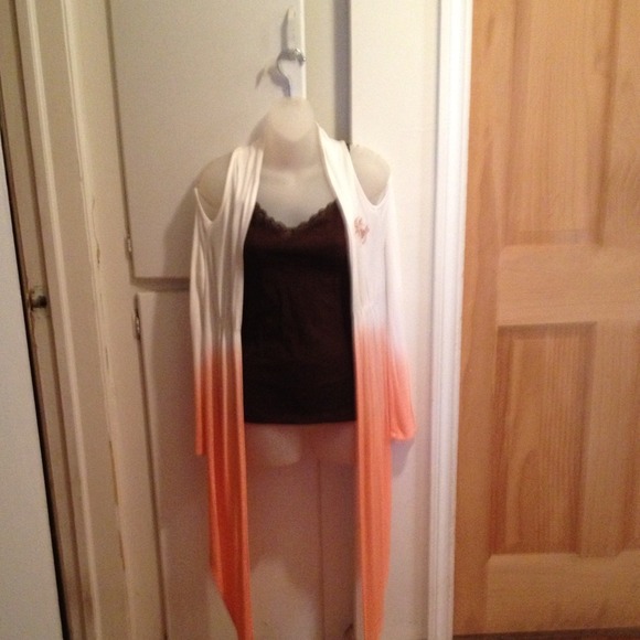 Sweater with longer front