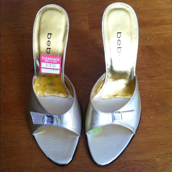 Gold bebe heels