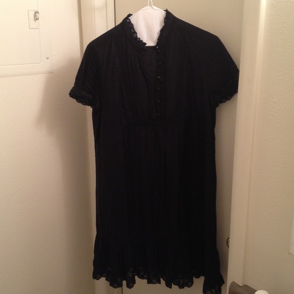 Black dress with lace detail. Never worn.