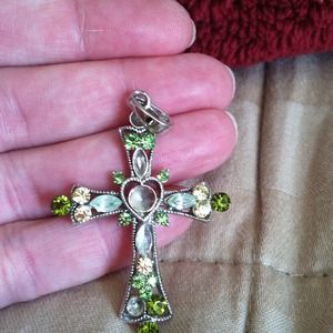 Green and yellow stone cross
