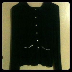 Jessica Simpson dark blue jacket