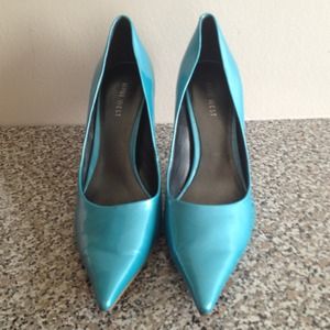 Nine West Patent leather pumps.