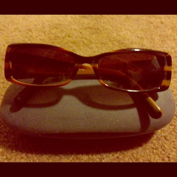 Miu miu brown sunglasses and case.