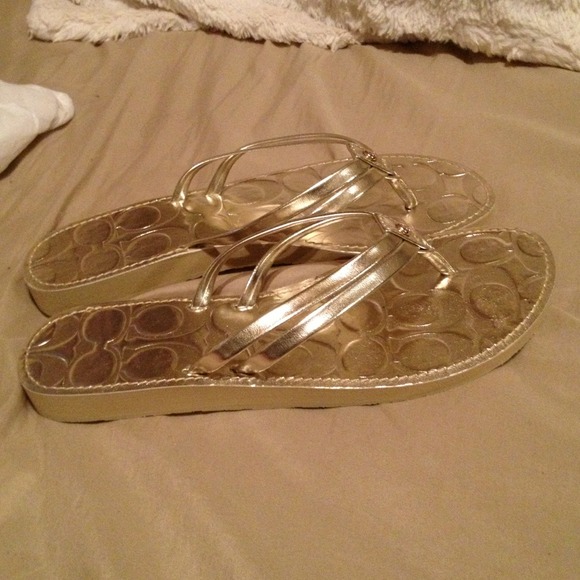 Coach flip flops. Never worn 7 1/2