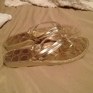Coach flip flops. Never worn 7 1/2