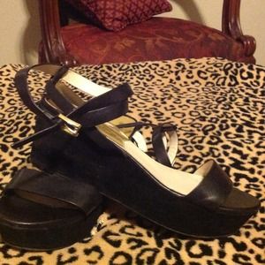 Beautiful Authentic Low Wedge Micheal Kor shoes.