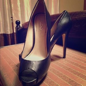 On sale Sexy black peep toe heels from Aldo.