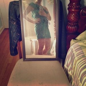 Off the shoulder green and black printed dress