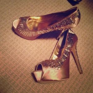 Saucy HIGH gold sequin heel.