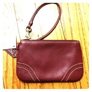 Brand New Leather COACH wristlet.