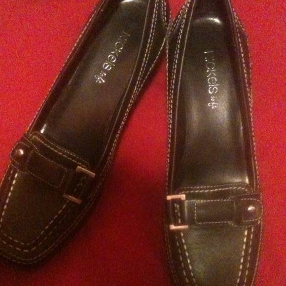 Black, leather casual low heel slip on shoes.