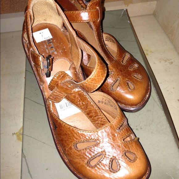 'Born" almost new brown wedges.