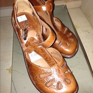 'Born" almost new brown wedges.