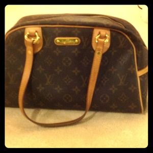 LV sporty bag.