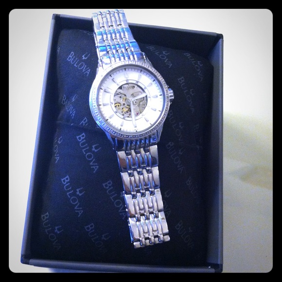 Bulova silver watch w/ mother of pearl face