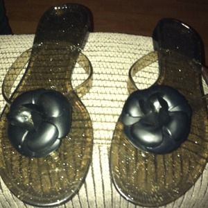 Black see-threw flip flops