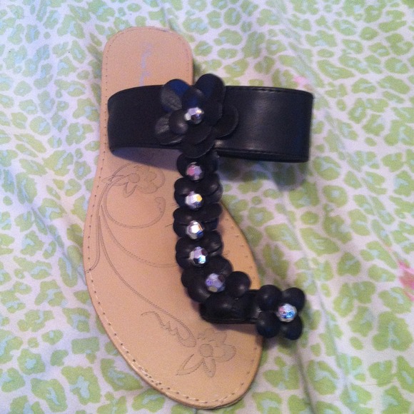 black sandals with flowers