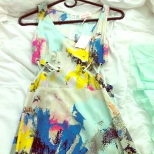 Combination pastel color high low rise dress