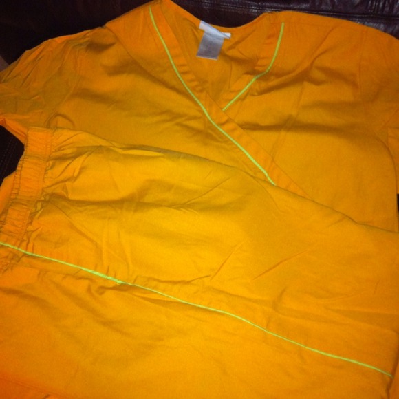 Orange scrubs with green strip