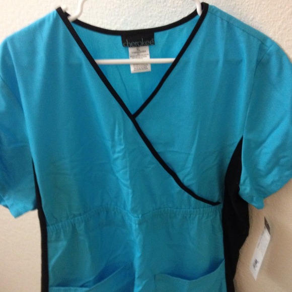 Sold!!! Cherokee flexible fit scrub top.