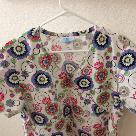 Multicolored floral print scrub top. New.