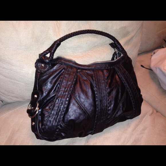 Carlos Santana hand bag
