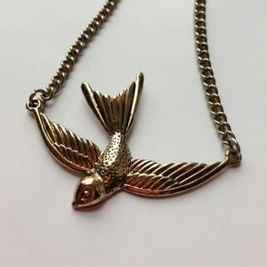 Metal necklace, flying bird, rustic gold color