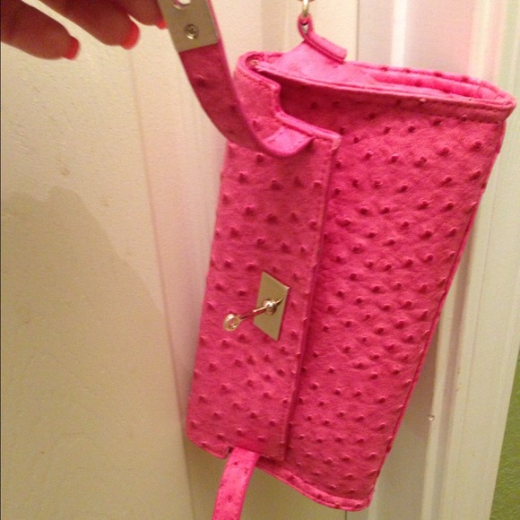 "RESERVED"Pink faux ostrich clutch.